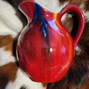 Vibrant Red and Blue Ceramic Art Piece with Glossy Finish